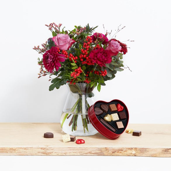 Den smukke julehilsen med hjerte med chokolade